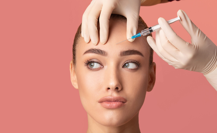 Young Woman Receiving Botox Beauty Injection